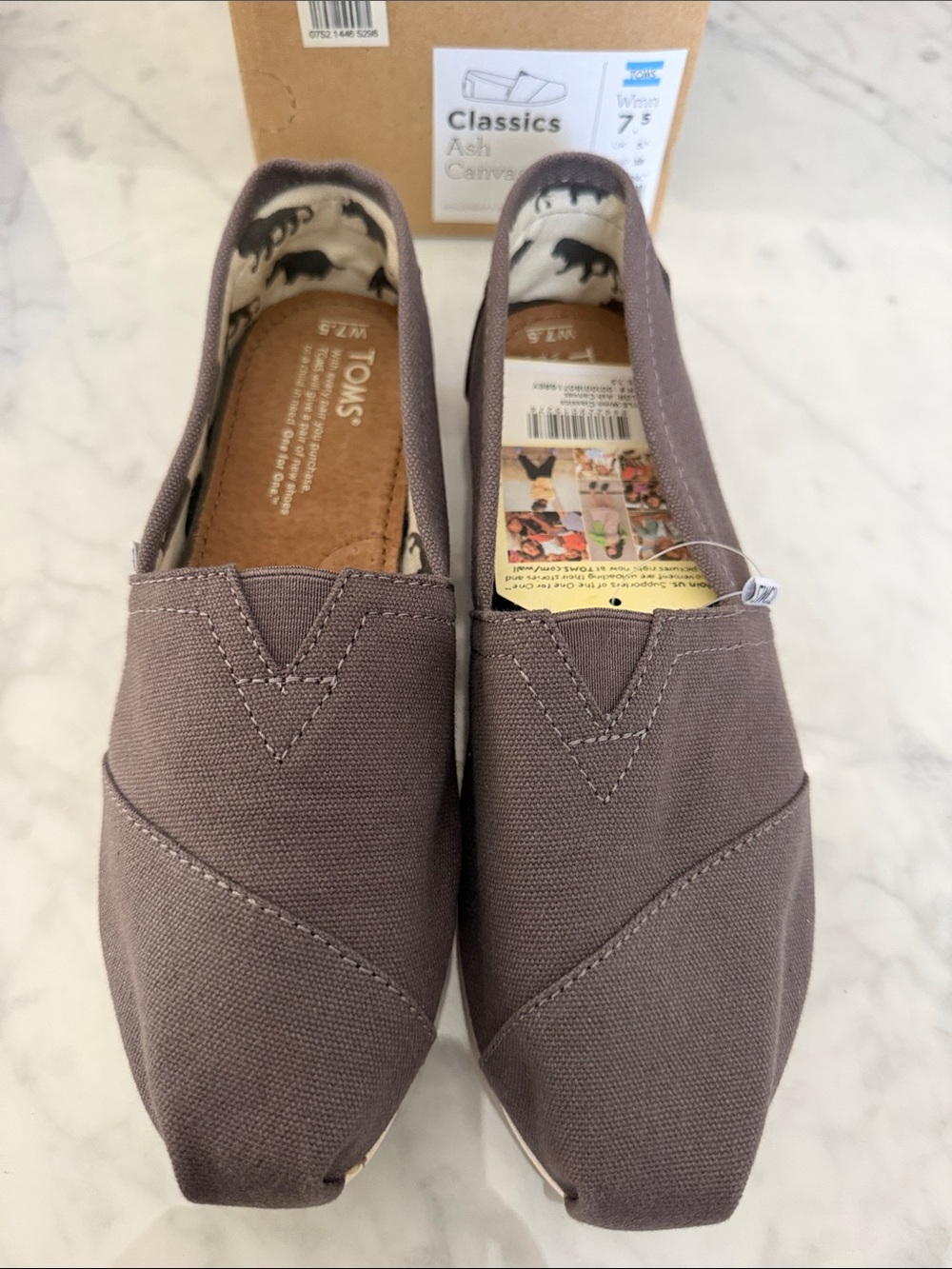Toms Slip-On Classics in Ash Gray Canvas